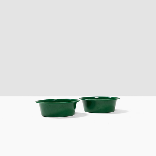 2 green bowl on a white surface