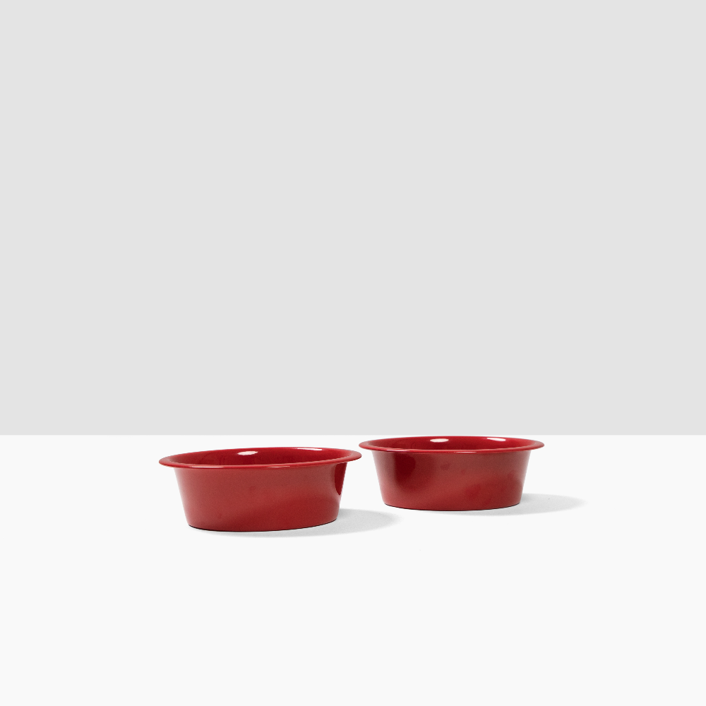 2 red bowl on a white surface